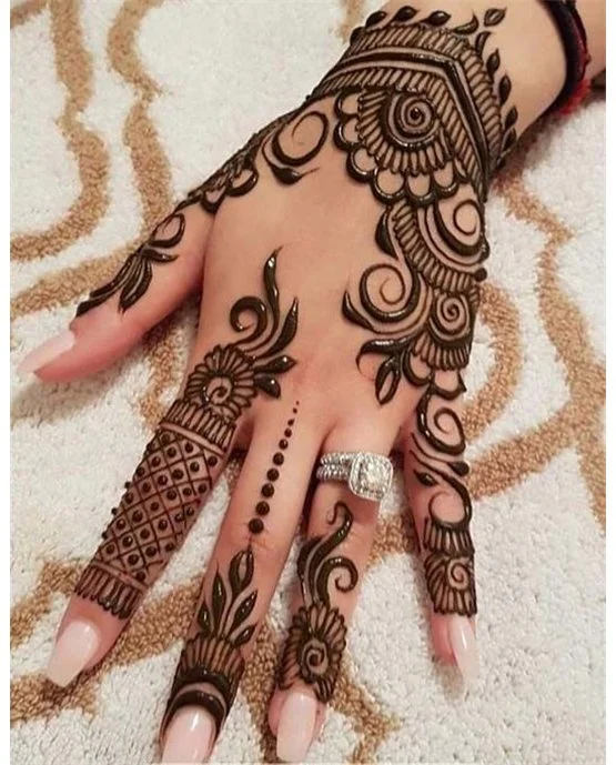 Dainty Silhouette And Hook Covering Back Hand Mehndi Design